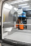 02_Compressore con avvolgitubo, Ecoflow e ripiani di scaffalatura su Man Tge