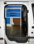 Berlingo Citroen con rivestimento interno in legno e lamiera
