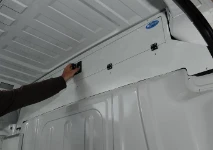 Scomparto sopra cabina